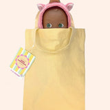 minikane poupee mini pancha prunelle avec tenue licorne dans tote bag